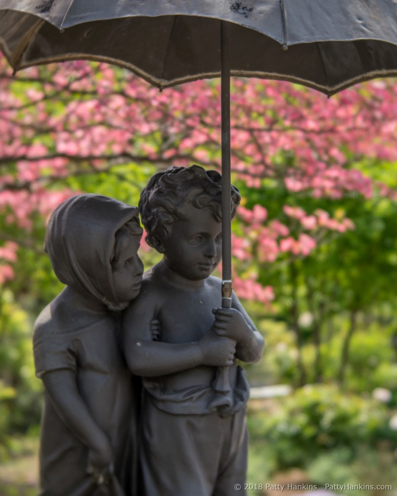 Sculpture with Pink Dogwood,  Oakland Cemetery in Atlanta, Georgia © 2018 Patty Hankins